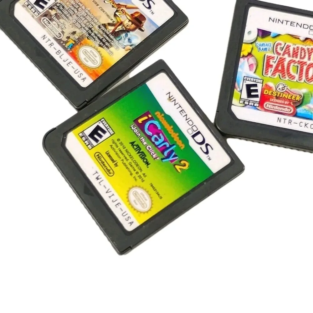 Nintendo DS Game Lot of 4 - Frozen, LEGO Indiana Jones, iCarly 2, Candy Factory